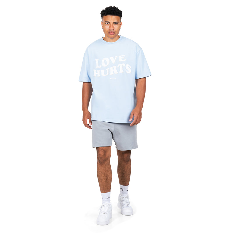 BABYBLUE LOVE HURTS T-SHIRT ÉLEVÉ