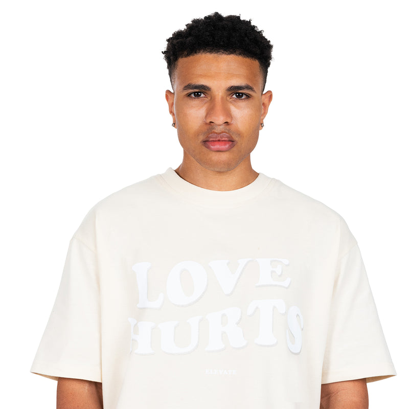 T-SHIRT SAND ELEVATE LOVE HURTS